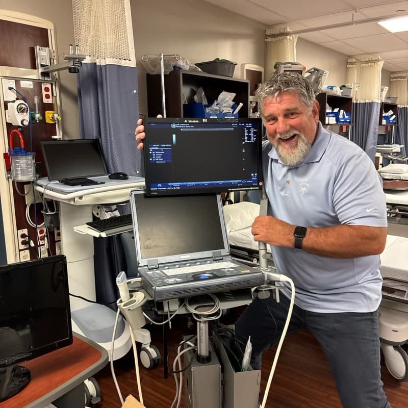 Paul Kearney with clinical device equipment on-site